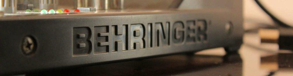 The Behringer logo on a desk