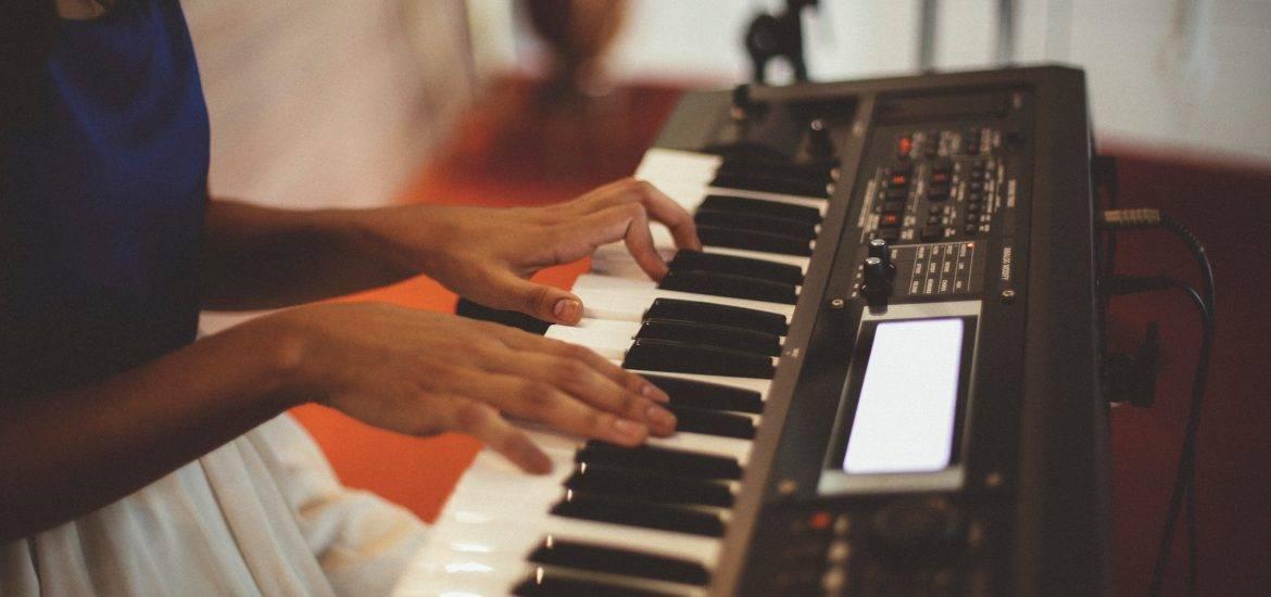 musician playing digital audio synth