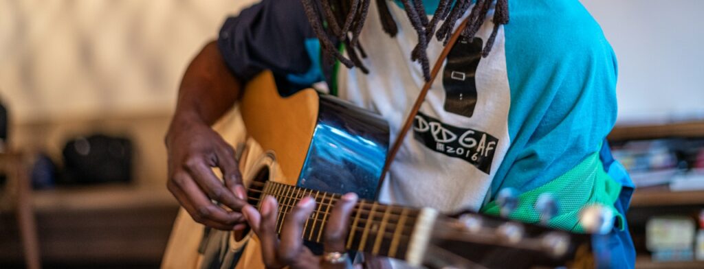 musician playing guitar